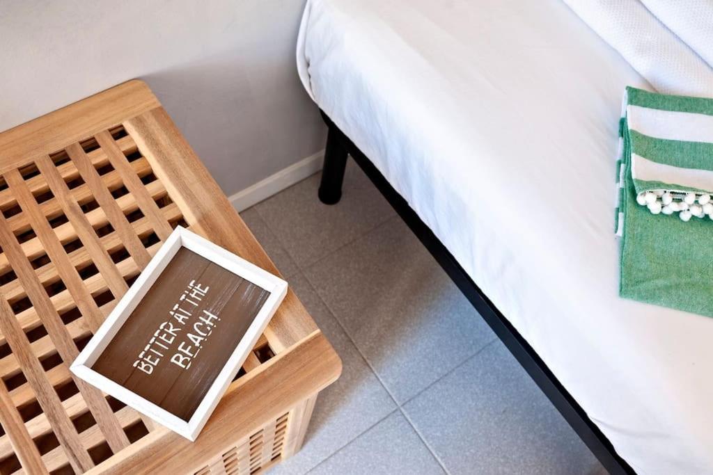 A bed or beds in a room at Cozy Flat and Terrace - 2 min from the beach by Sweet Home Puglia Apartments