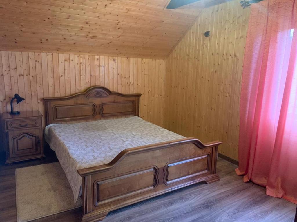 Postel nebo postele na pokoji v ubytování Бойківчанка