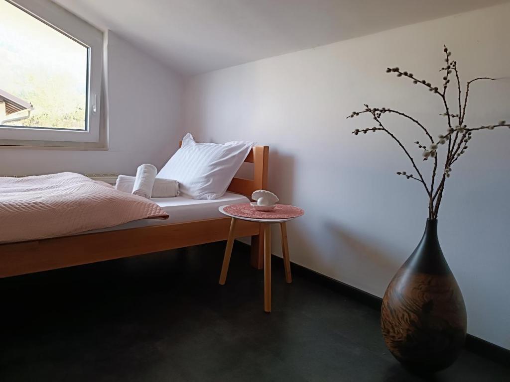 Posteľ alebo postele v izbe v ubytovaní Apartma FRIGO