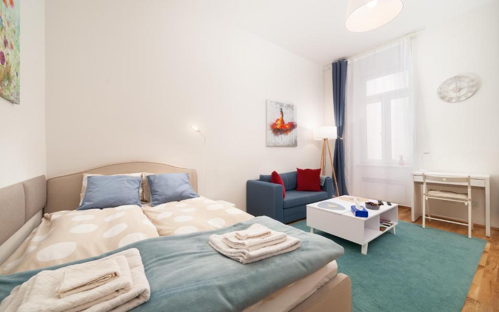 Posteľ alebo postele v izbe v ubytovaní MALIXA - Apartment in the heart of Vienna next to Metro