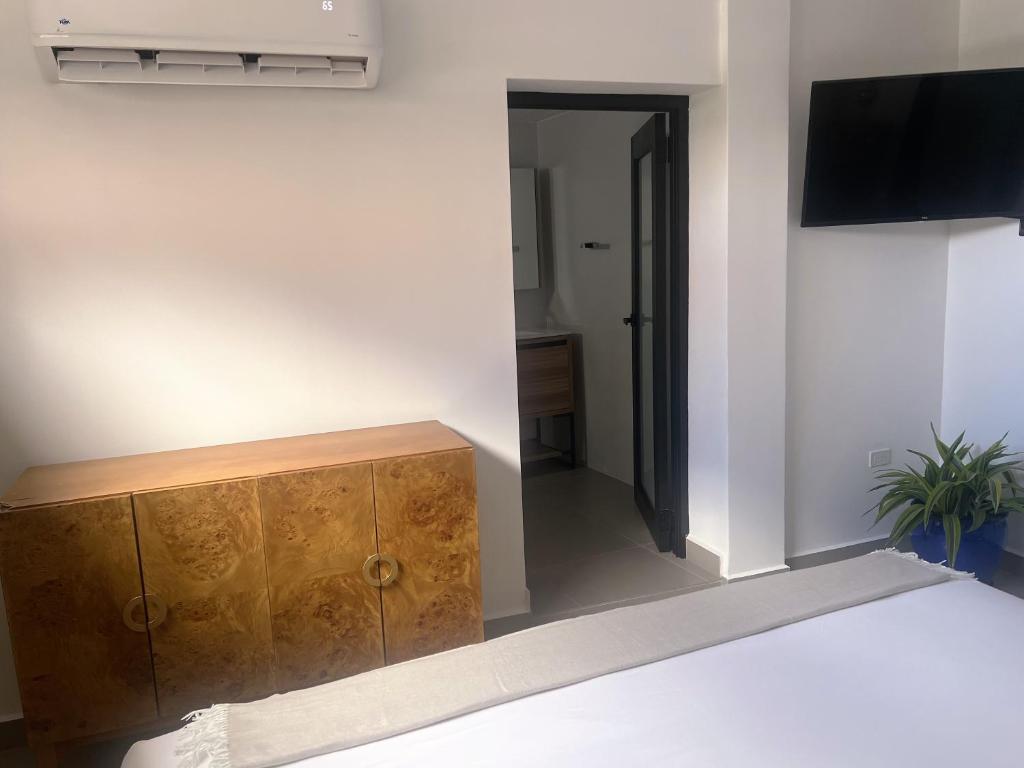 Postel nebo postele na pokoji v ubytování La Calma Poshtel