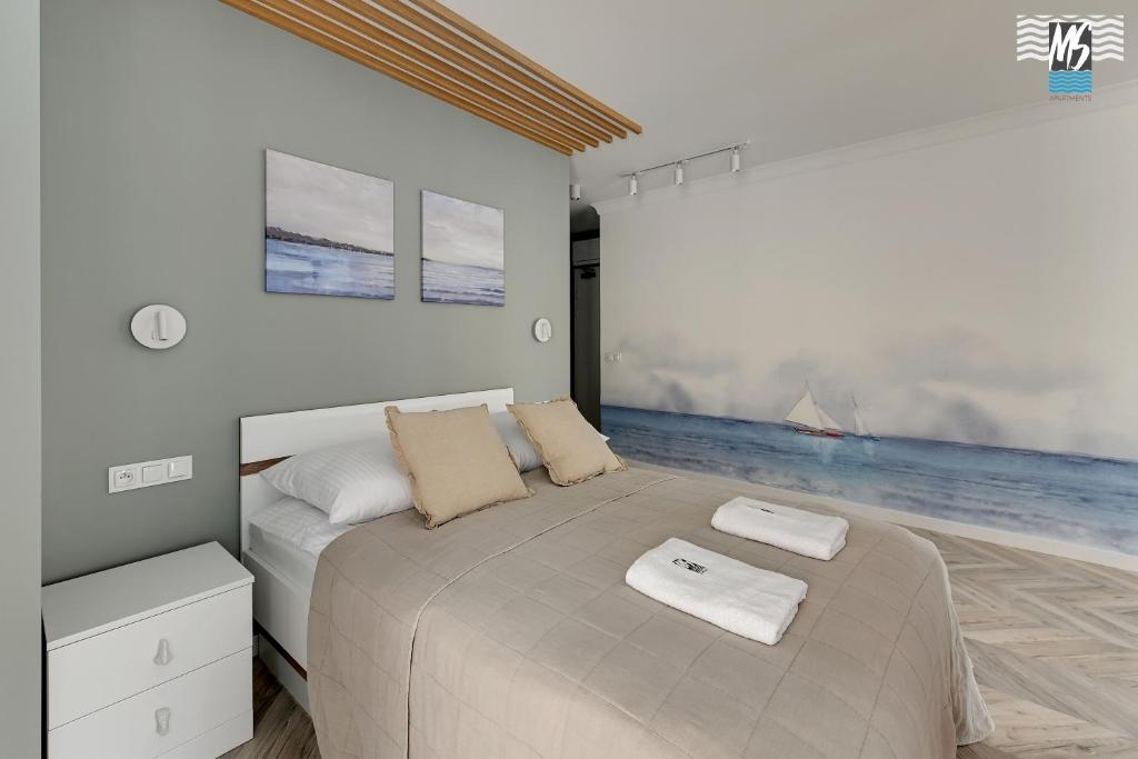 En eller flere senge i et værelse på MS Apartments Rest 3.0