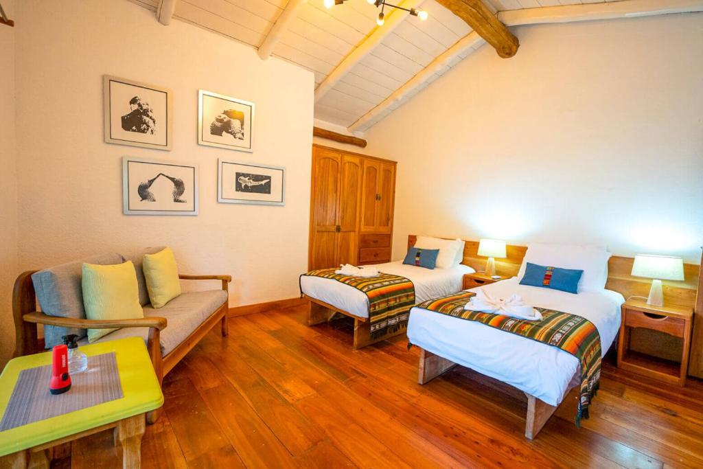 Postel nebo postele na pokoji v ubytování Enchanted Galapagos Lodge