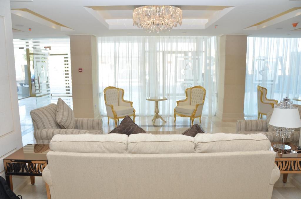 Posezení v ubytování Adams Hotel