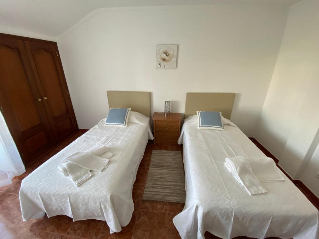 Postel nebo postele na pokoji v ubytování Ericeira Sand Beach R5