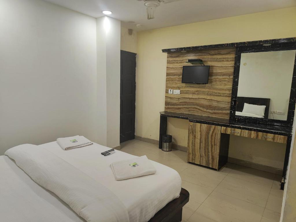 Postel nebo postele na pokoji v ubytování Hotel Apple Villa - New Delhi