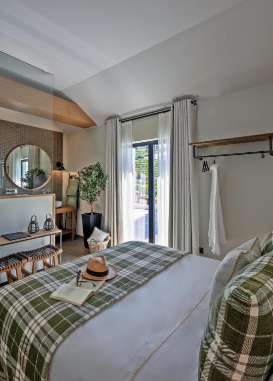 Uma cama ou camas num quarto em Quinta da Salada - Turismo Rural