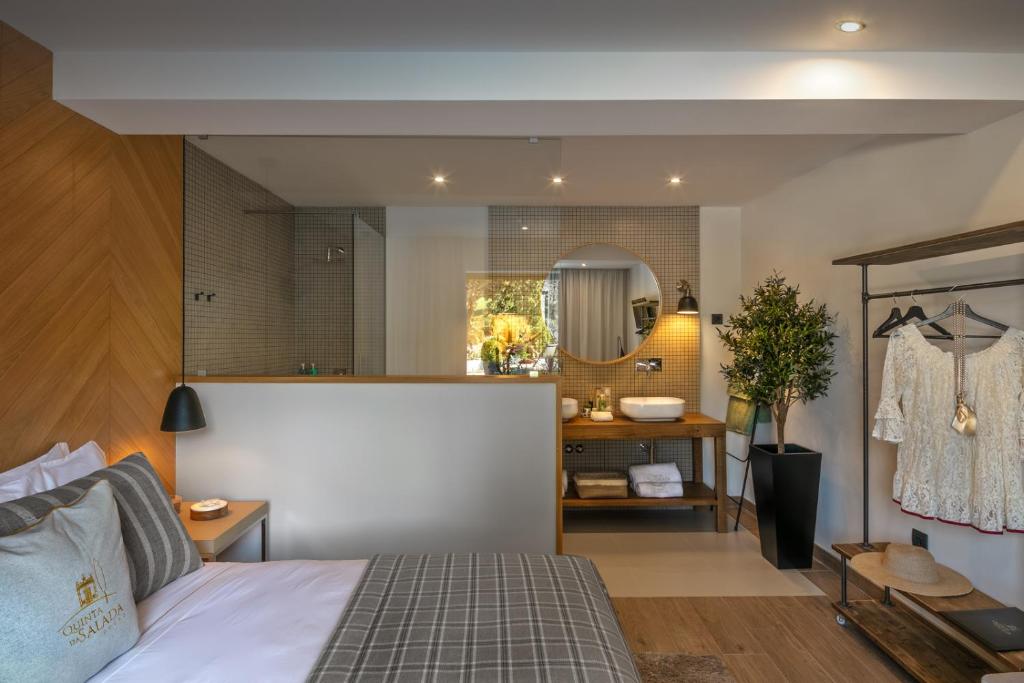 Uma cama ou camas num quarto em Quinta da Salada - Turismo Rural