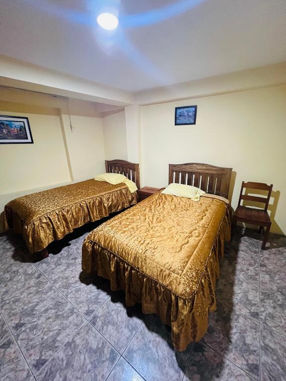 Una cama o camas en una habitación de Euro Hostal