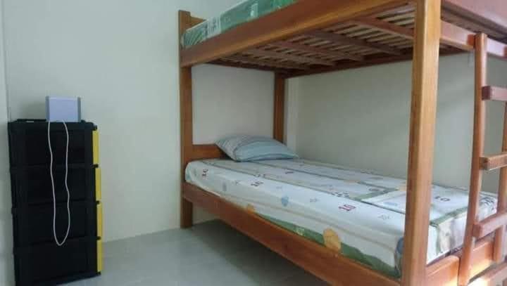 Postel nebo postele na pokoji v ubytování OCEANSURF hosteria