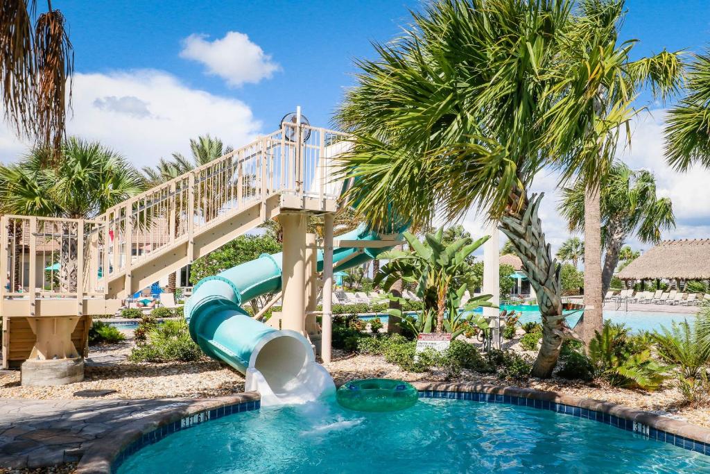 a water slide in a resort with a slide at Modern Luxury at Champions Gate Resort in Davenport