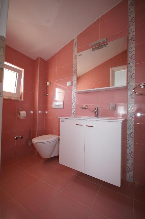 Kúpeľňa v ubytovaní Apartments Villa Rosina