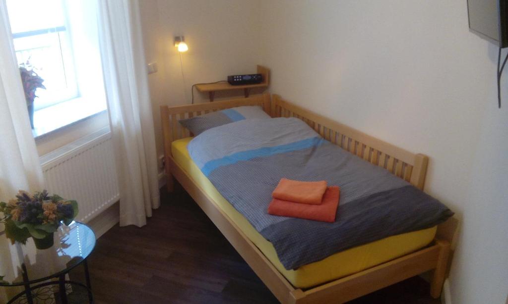 Postel nebo postele na pokoji v ubytování DARZ GästeZimmer