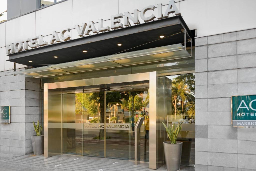 a store front of a building with a sign on it at AC Hotel Valencia by Marriott in Valencia