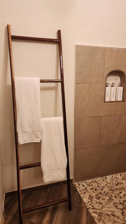 Postel nebo postele na pokoji v ubytování Hotel Cabañas Aldea Maya