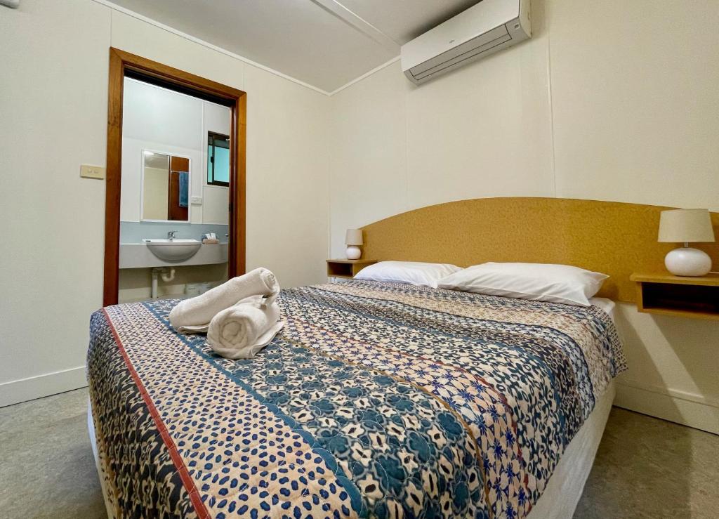 Postel nebo postele na pokoji v ubytování Big4 Port Douglas, Glengarry Holiday Park
