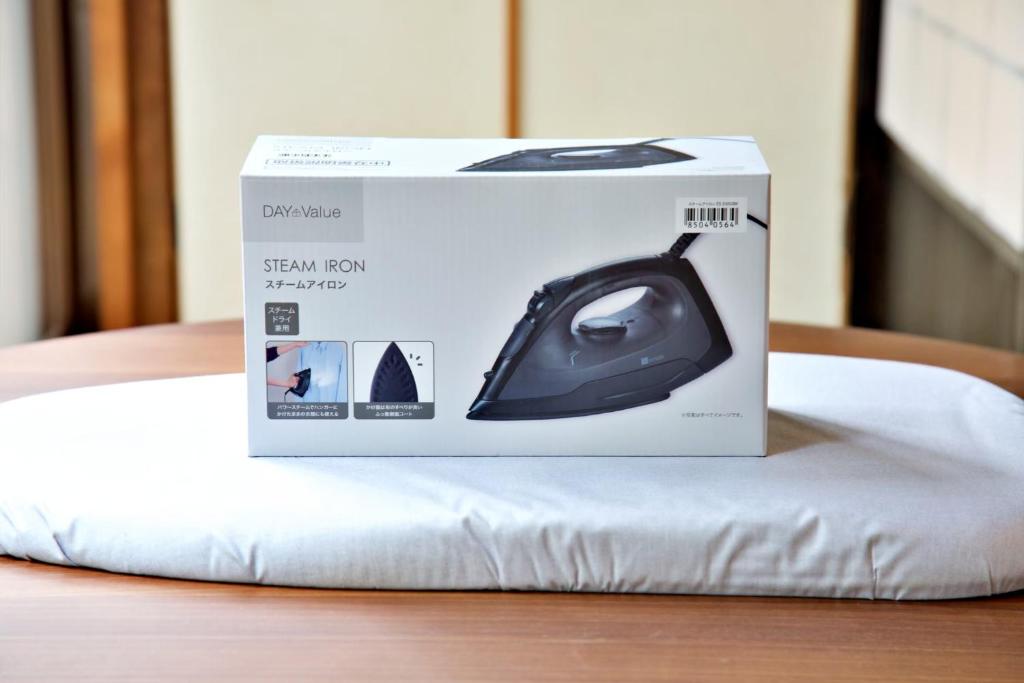 Postel nebo postele na pokoji v ubytování push house 伊東