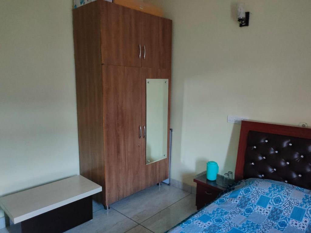 Postel nebo postele na pokoji v ubytování Mahamaya Homestay 4