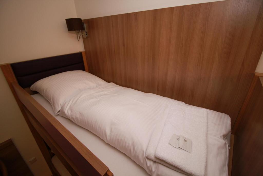 Postel nebo postele na pokoji v ubytování Slamba Hostel