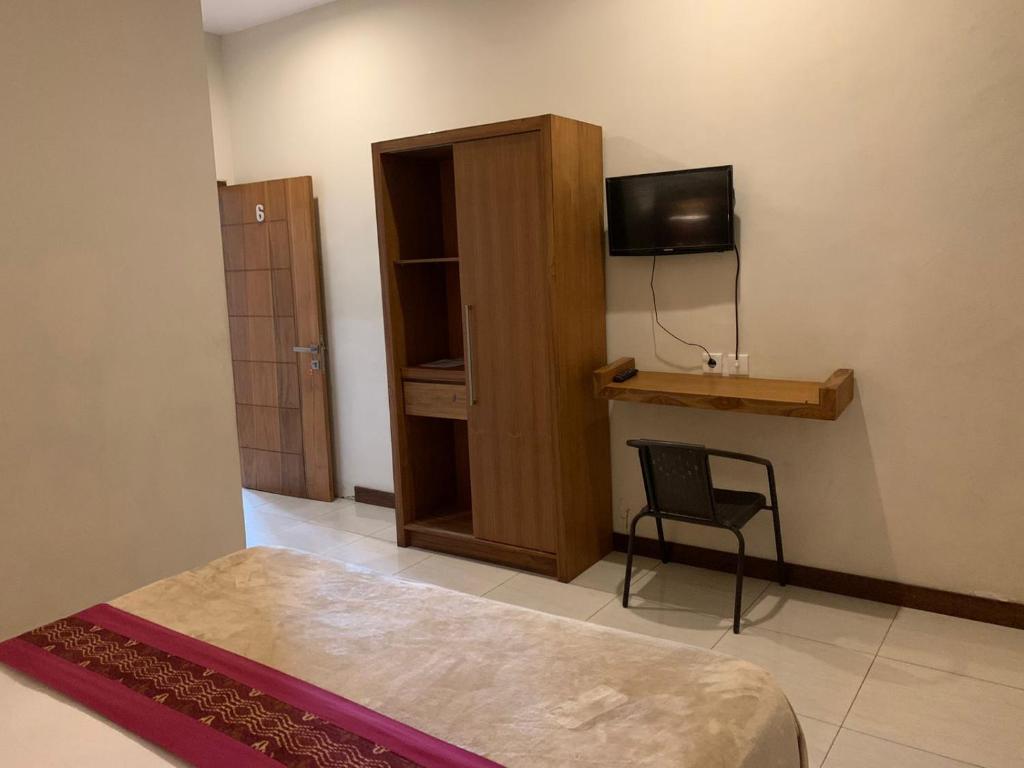 Kuta Suci Guesthouse - Standard Double Room