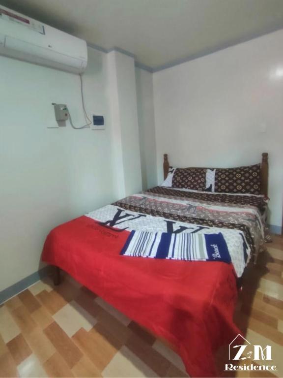 Postel nebo postele na pokoji v ubytování ZM Residence