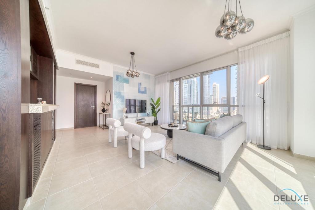 Posezení v ubytování Glamorous 1BR at Residences 5 Downtown Dubai by Deluxe Holiday Homes