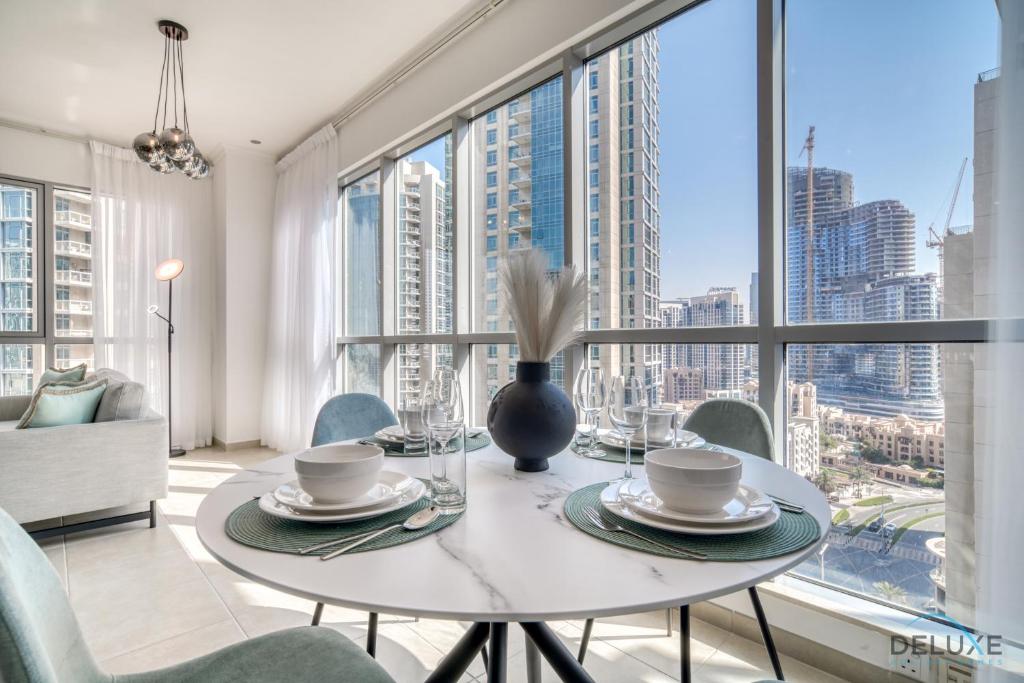 Fotografie z fotogalerie ubytování Glamorous 1BR at Residences 5 Downtown Dubai by Deluxe Holiday Homes v Dubaji