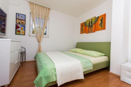 Postel nebo postele na pokoji v ubytování Apartment Mika 3