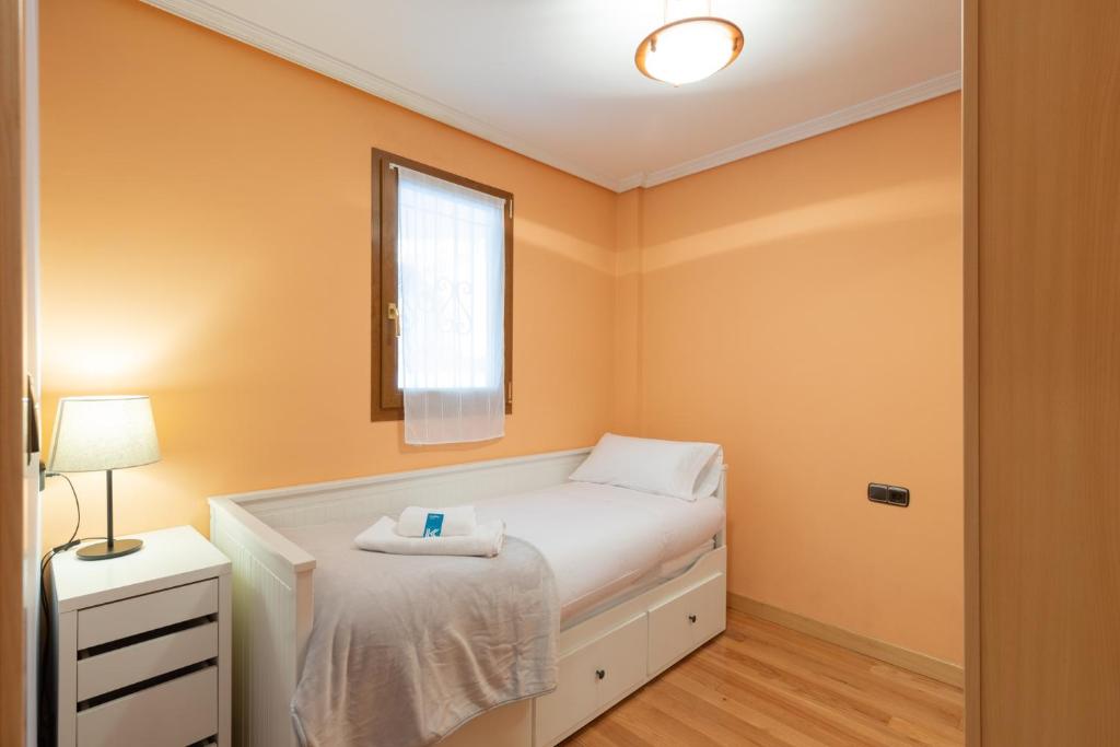 Postel nebo postele na pokoji v ubytování Saturraran - baskeyrentals