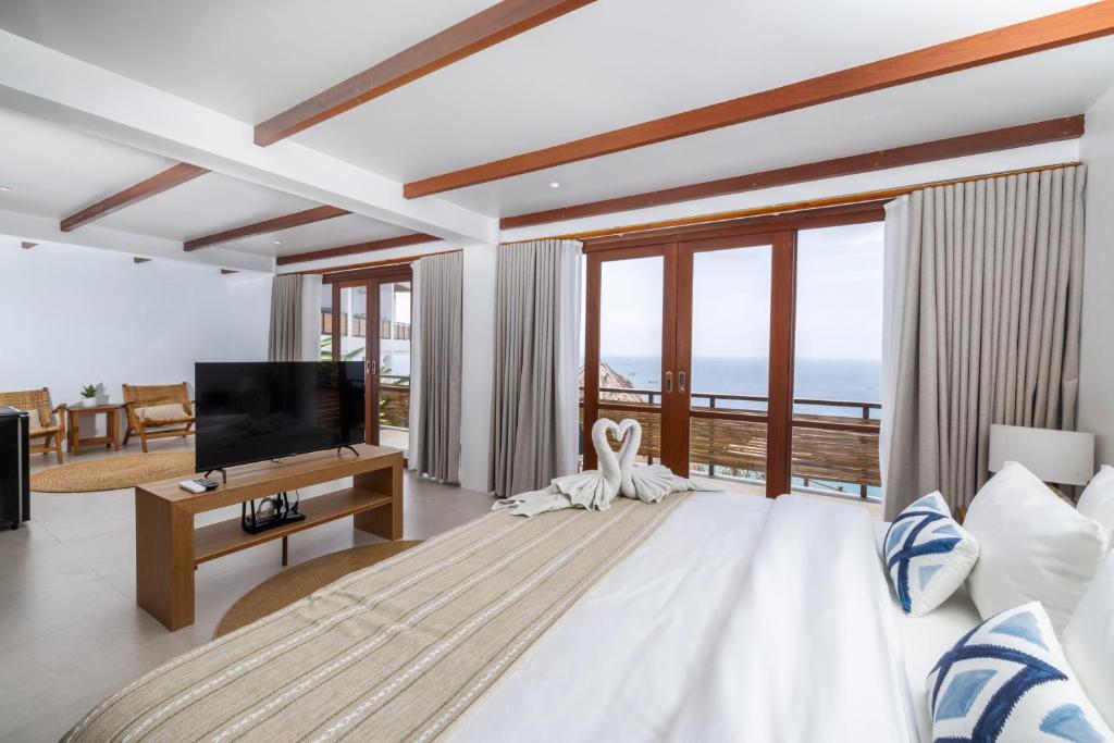 TV a/nebo společenská místnost v ubytování The AVA Resort Koh Tao
