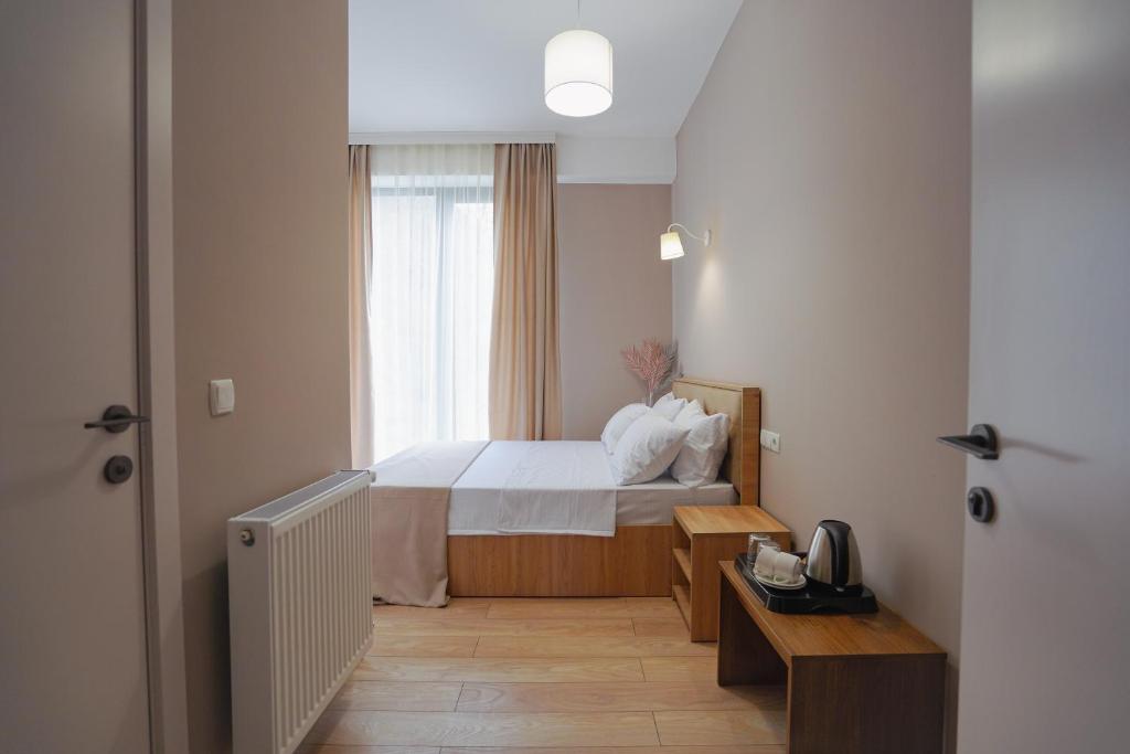 Postel nebo postele na pokoji v ubytování Tilia Kvareli Resort