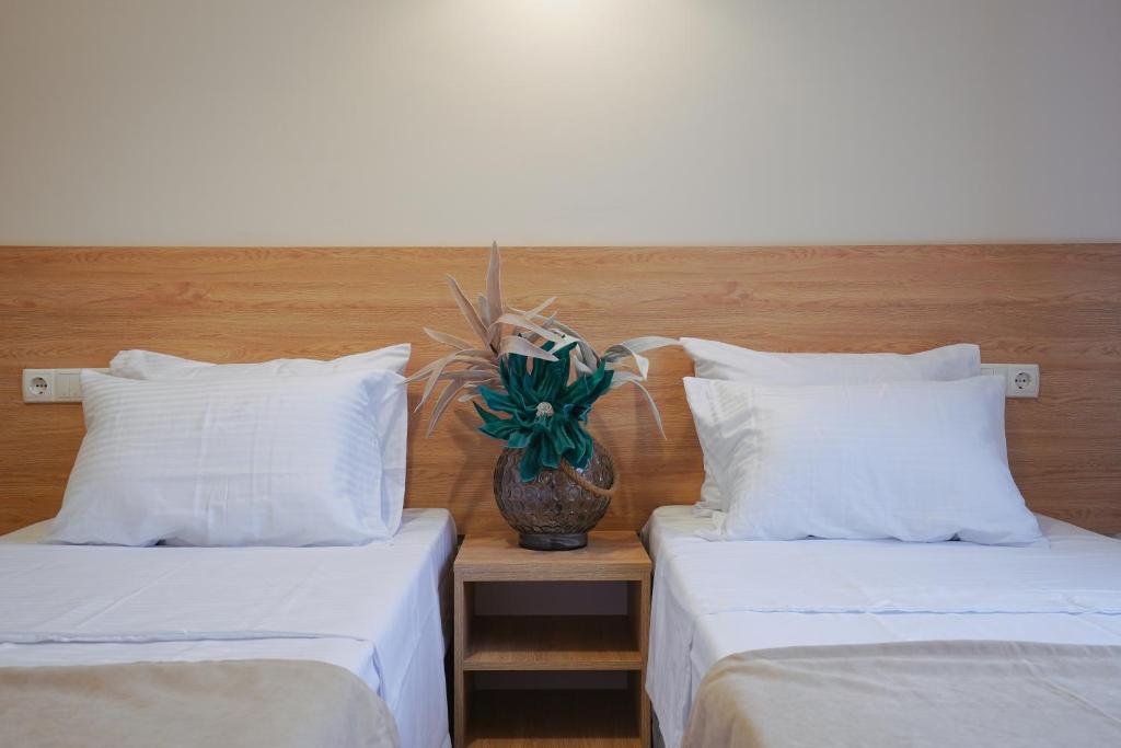 Postel nebo postele na pokoji v ubytování Tilia Kvareli Resort