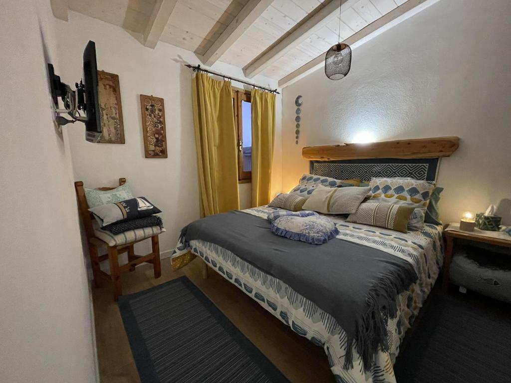 מיטה או מיטות בחדר ב-Perla Marina