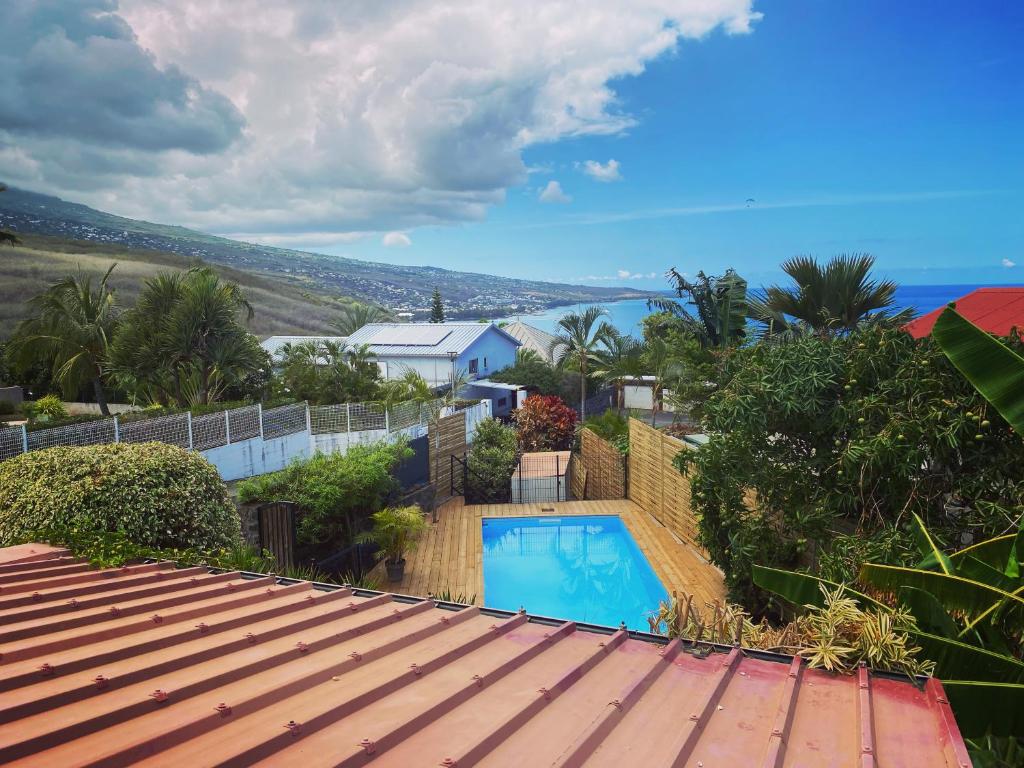 a view from the roof of a house with a swimming pool at Villa Sea View in Saint-Leu