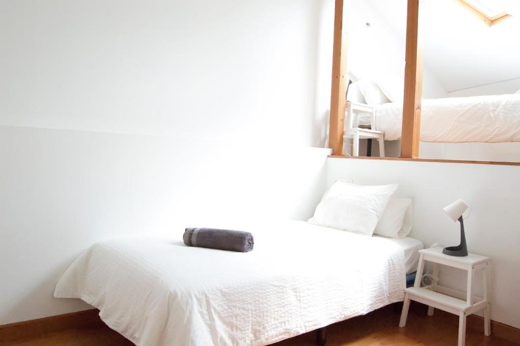 Posteľ alebo postele v izbe v ubytovaní Apartamento Carmen II
