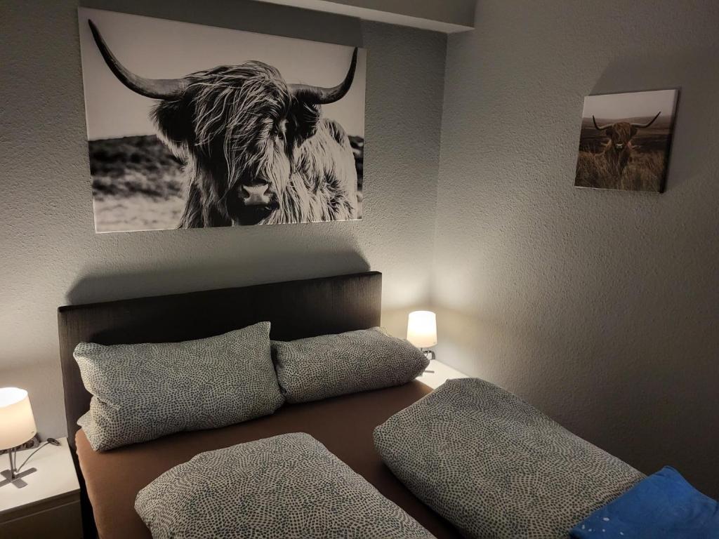 Postel nebo postele na pokoji v ubytování Kappeln Zentrum Möwennest