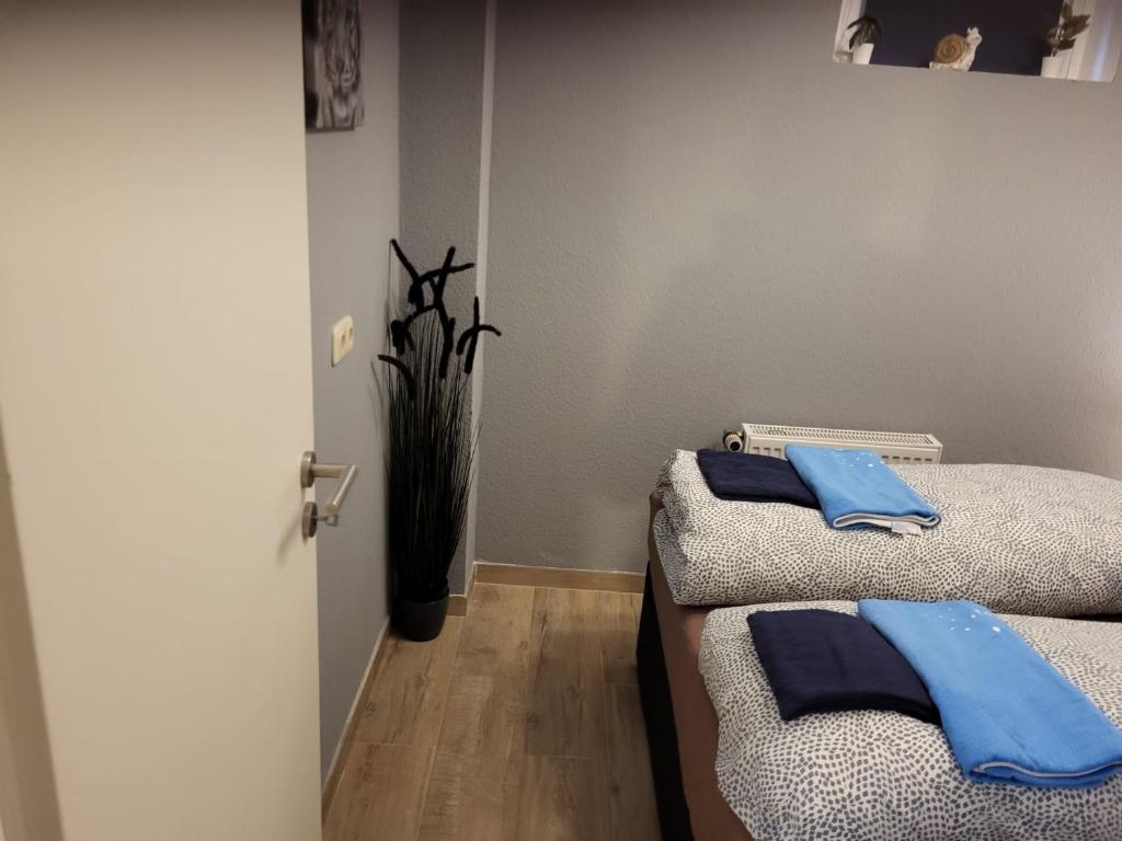 Postel nebo postele na pokoji v ubytování Kappeln Zentrum Möwennest