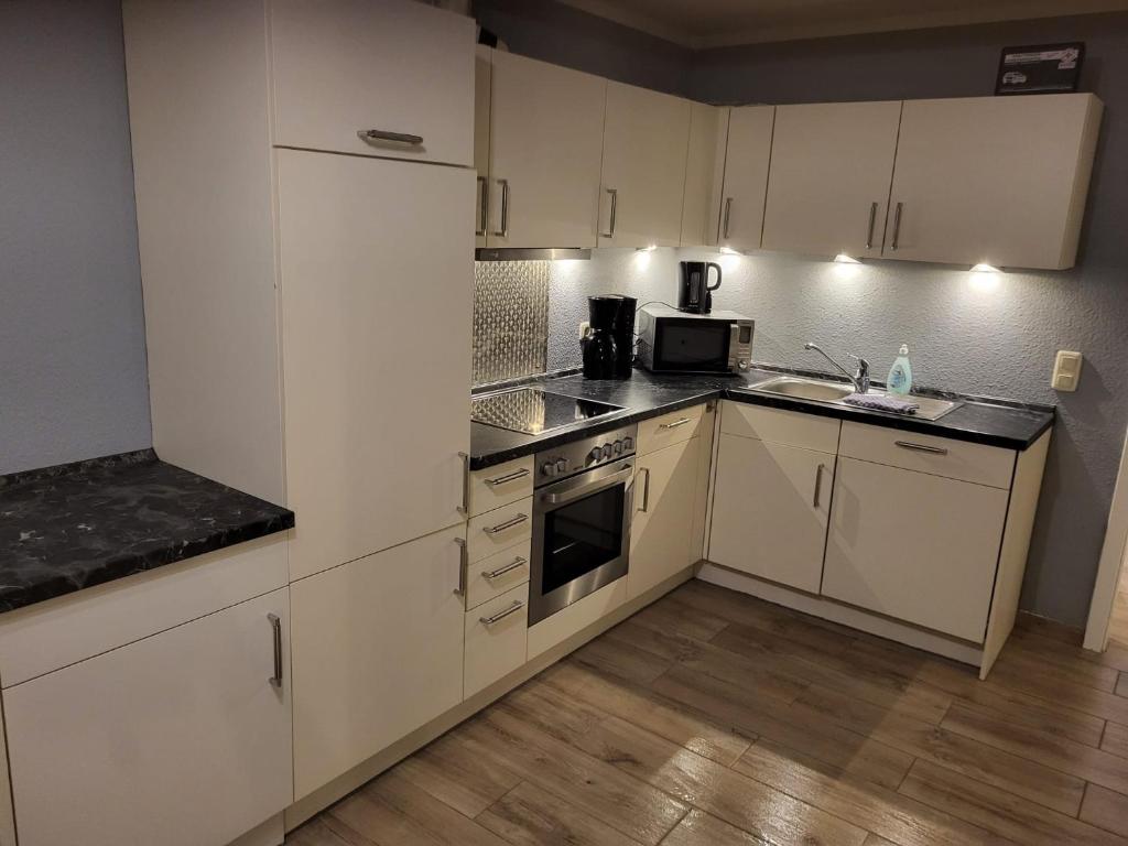 Kuchyň nebo kuchyňský kout v ubytování Kappeln Zentrum Möwennest
