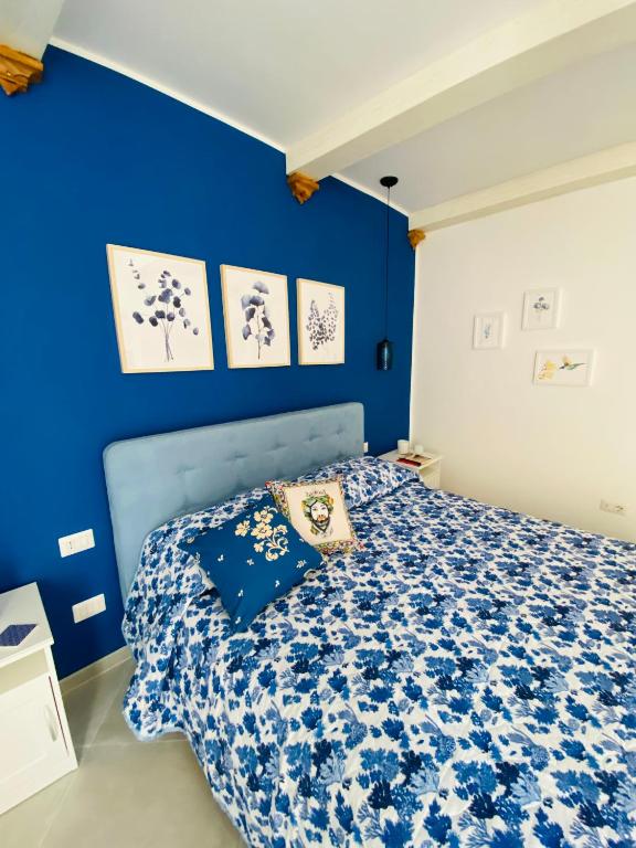 Postel nebo postele na pokoji v ubytování Casa 68 Ortigia