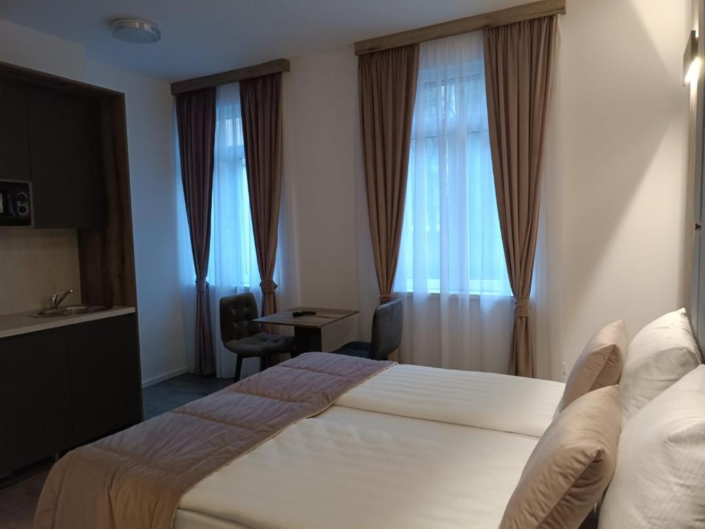 Postel nebo postele na pokoji v ubytování Casa ARTEE Free Parking