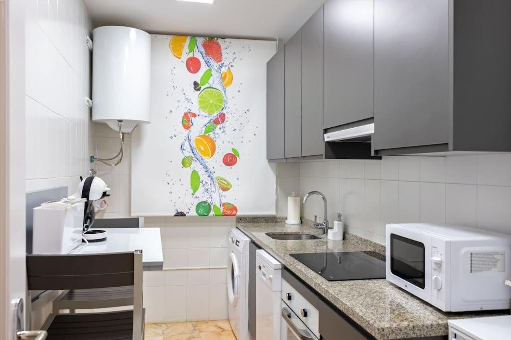 A kitchen or kitchenette at Jimios city center by Valcambre