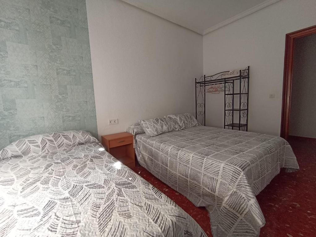 Posteľ alebo postele v izbe v ubytovaní Vivienda Agustín Durán
