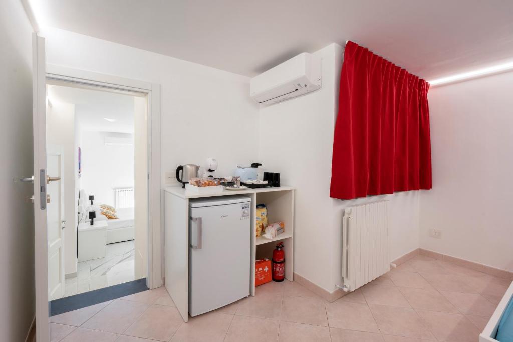 Kuchyň nebo kuchyňský kout v ubytování Deluxe Suites