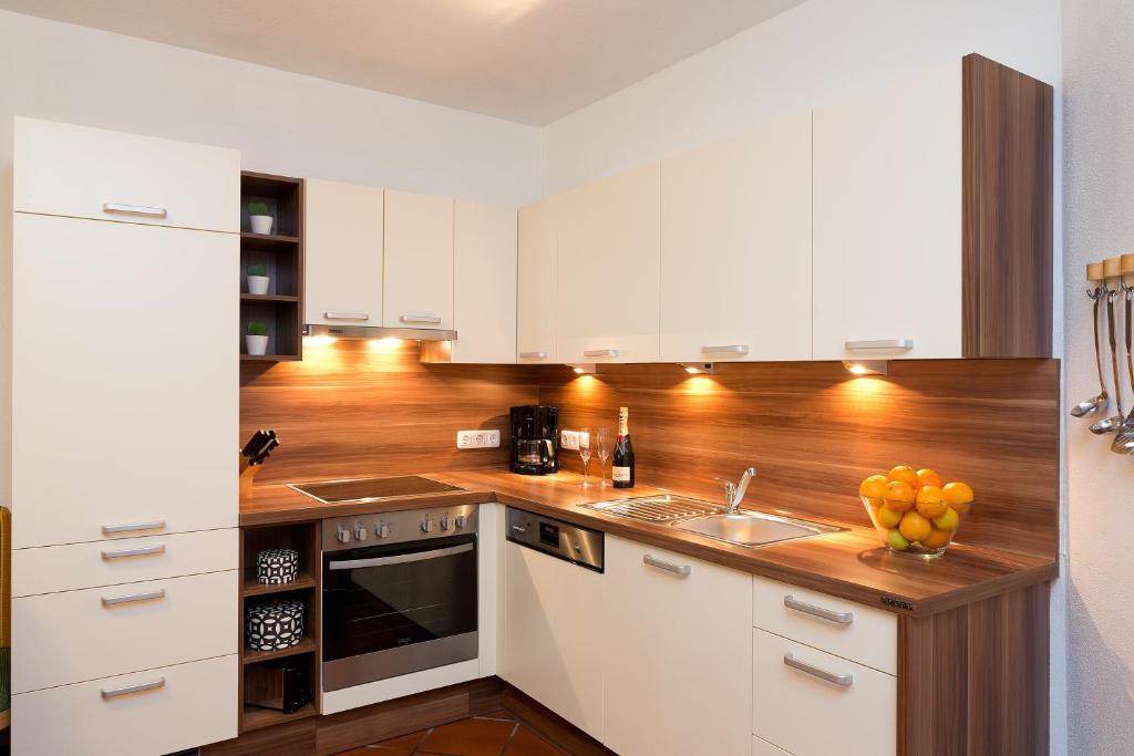 Kuchyň nebo kuchyňský kout v ubytování Sonn-Alm Chalet-Apartments
