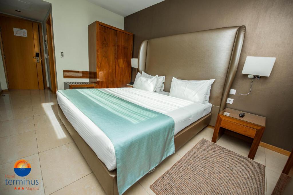 Voodi või voodid majutusasutuse Hotel Terminus Maputo toas