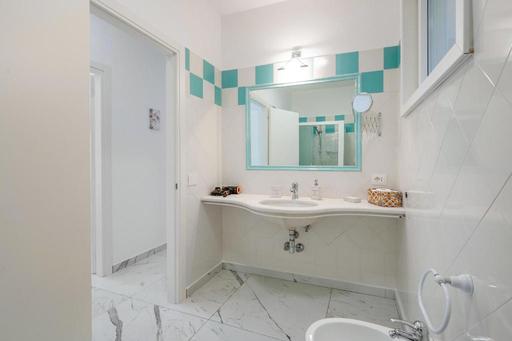 Koupelna v ubytování Deluxe Suites
