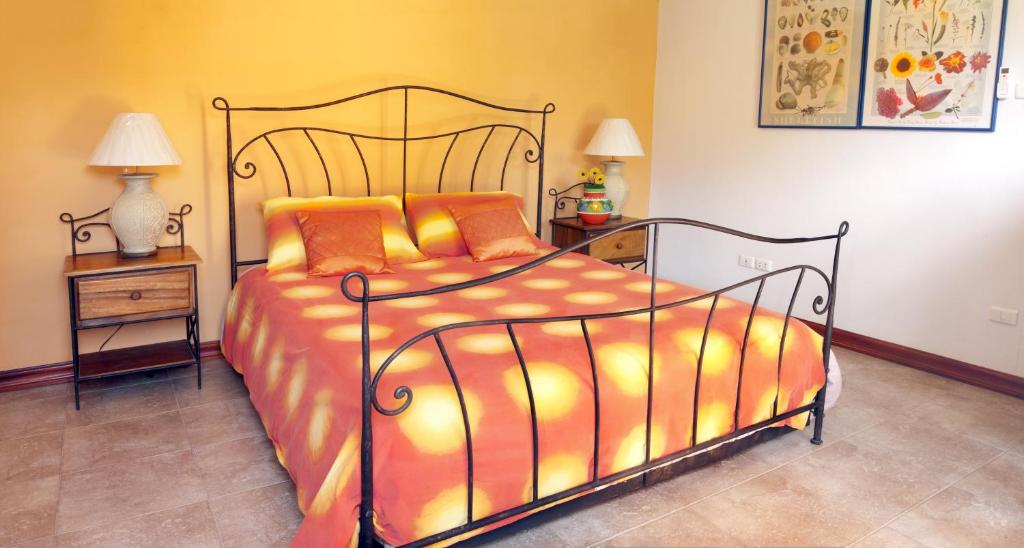 A bed or beds in a room at Villa Espana