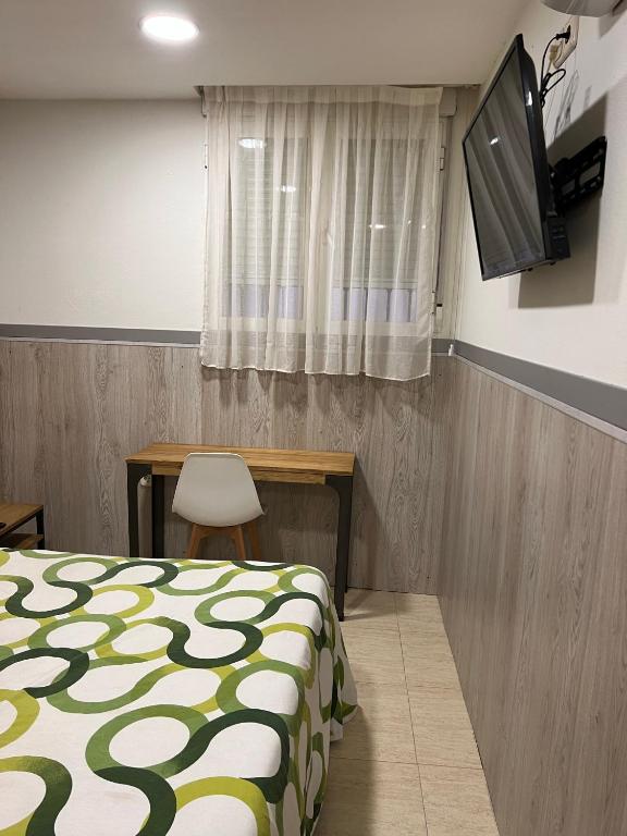 TV a/nebo společenská místnost v ubytování Hostal 82