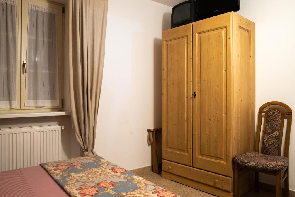 Postel nebo postele na pokoji v ubytování Garnì Centrale