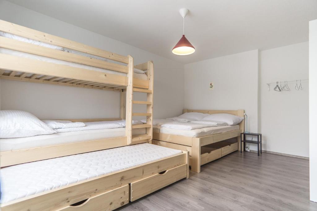 Postel nebo postele na pokoji v ubytování Statek Losiny